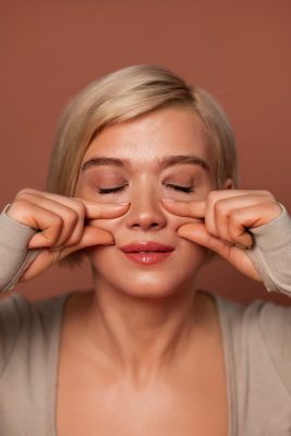 Woman showing under eye area for juvederm injection